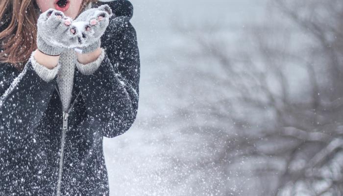 Woman in snowy winter.